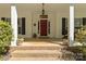 Inviting front porch with brick steps and ample space for seating and decor at 1956 Forest Ridge Dr, Stanley, NC 28164