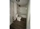 Modest bathroom featuring a shower-tub combo, toilet, and clean, modern surfaces at 2131 Barnett St, Lancaster, SC 29720