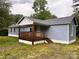 Charming single-story home with a covered front porch and light blue siding at 2131 Barnett St, Lancaster, SC 29720