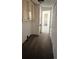 Hallway with new wood floors and fresh white paint at 2131 Barnett St, Lancaster, SC 29720