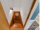 Basement stairs with wood paneling and decor leading to a lower level at 281 Emerald Shores Rd, Mount Gilead, NC 27306
