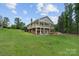 Spacious two-story home featuring a walkout basement and large backyard at 281 Emerald Shores Rd, Mount Gilead, NC 27306
