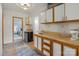 Functional kitchenette featuring ample cabinet space and a convenient mini-fridge at 281 Emerald Shores Rd, Mount Gilead, NC 27306