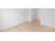 A light filled room shows light wood floors, and neutral walls creating a serene atmosphere at 2813 New Pineola Rd, Charlotte, NC 28208