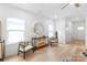 Bright and airy living room filled with natural light, tastefully decorated with plants, and modern decor, ideal for relaxation at 2813 New Pineola Rd, Charlotte, NC 28208