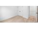 Bright bedroom features a closet and neutral decor, creating a serene and inviting atmosphere at 2815 New Pineola Rd, Charlotte, NC 28208
