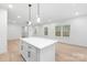 Expansive living room with natural light, featuring an open floor plan and modern finishes at 2815 New Pineola Rd, Charlotte, NC 28208