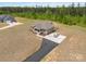 Expansive aerial view of the home, showcasing the spacious lot and paved driveway at 3015 Great Falls Hwy, Chester, SC 29014