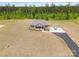 Aerial view of a home highlighting its landscaped yard and private driveway at 3015 Great Falls Hwy, Chester, SC 29014