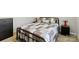 Cozy bedroom features a decorative quilt and floral accents at 3015 Great Falls Hwy, Chester, SC 29014