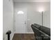 Bright entryway featuring wood-look floors and a classic white front door at 3015 Great Falls Hwy, Chester, SC 29014