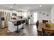 Well-lit kitchen and dining area with stainless steel appliances and modern finishes at 3015 Great Falls Hwy, Chester, SC 29014