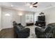 Cozy living room with a fireplace and large windows for natural light at 3015 Great Falls Hwy, Chester, SC 29014