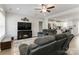 Living room with a ceiling fan and view to the modern kitchen at 3015 Great Falls Hwy, Chester, SC 29014