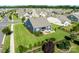 An aerial view of a blue home featuring a beautifully landscaped yard and a charming patio area at 3103 Oliver Stanley Trl, Lancaster, SC 29720