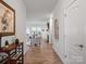Hallway view into a cozy living room with stylish furnishings and lots of natural light at 3103 Oliver Stanley Trl, Lancaster, SC 29720