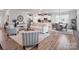 Cozy living room with an open concept features a dining area and a modern, bright kitchen at 3103 Oliver Stanley Trl, Lancaster, SC 29720