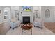 Charming living room with built-in shelves flanking a fireplace, creating a cozy atmosphere at 3103 Oliver Stanley Trl, Lancaster, SC 29720