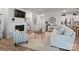 Bright living area showcases an open floor plan and a fireplace with built-in shelving at 3103 Oliver Stanley Trl, Lancaster, SC 29720