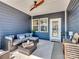 Inviting patio with outdoor seating and a ceiling fan, perfect for relaxation and enjoying the outdoors at 3103 Oliver Stanley Trl, Lancaster, SC 29720