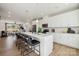 Bright kitchen with stainless appliances, an island with seating and modern lighting at 3128 Stelfox St, Charlotte, NC 28262