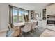 Elegant dining room with a bar area with wine storage and a view to the outside at 3132 Stelfox St, Charlotte, NC 28262