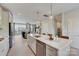 Spacious kitchen with a large island, stainless steel appliances, and an open view into the living room at 3132 Stelfox St, Charlotte, NC 28262
