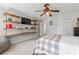 This bedroom features custom wood shelving and a ceiling fan at 335 Bob White Run, Salisbury, NC 28147