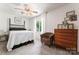 This bedroom features a vintage dresser and natural lighting at 335 Bob White Run, Salisbury, NC 28147