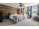 Charming bedroom with accent wall, stylish decor, and plenty of natural light from the window at 335 Bob White Run, Salisbury, NC 28147