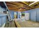 Unfinished basement provides ample storage and direct access to the backyard at 3828 Delgany Dr, Charlotte, NC 28215