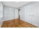 Spacious bedroom with hardwood floors and ample closet space at 3828 Delgany Dr, Charlotte, NC 28215