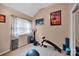 Bedroom featuring exercise equipment, neutral paint, and ample natural light at 3864 Meadow Ridge Nw Dr, Concord, NC 28027