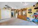 Spacious bonus room with custom display cabinets and track lighting at 3864 Meadow Ridge Nw Dr, Concord, NC 28027