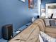 Inviting living room featuring custom built-ins and outlets above the sofa, offering modern convenience and style at 3864 Meadow Ridge Nw Dr, Concord, NC 28027