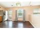 Bright dining area features wood flooring and large windows at 4002 Solomons Ct, Monroe, NC 28110