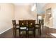 Elegant dining room with hardwood floors and a modern light fixture at 4002 Solomons Ct, Monroe, NC 28110