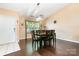 Bright dining area with hardwood floors and a contemporary light fixture at 4002 Solomons Ct, Monroe, NC 28110