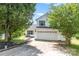Charming two-story home with a well-maintained lawn, featuring a two-car garage and classic white siding at 4002 Solomons Ct, Monroe, NC 28110