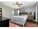 Spacious main bedroom boasts a ceiling fan and natural light at 4002 Solomons Ct, Monroe, NC 28110