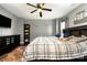 Spacious main bedroom boasts a ceiling fan and natural light at 4002 Solomons Ct, Monroe, NC 28110