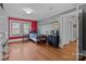 Bedroom with hardwood floors and a large window at 402 School St, Rockwell, NC 28138