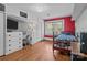 Bedroom with hardwood floors and a built-in desk at 402 School St, Rockwell, NC 28138