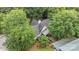 Aerial view of roof of home and deck nestled amongst trees at 4038 Forest Brook Dr, Edgemoor, SC 29712