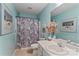 Bathroom featuring light blue walls, a patterned shower curtain, and a white vanity at 4038 Forest Brook Dr, Edgemoor, SC 29712