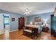 Spacious bedroom with en-suite bathroom, hardwood floors and ceiling fan at 4038 Forest Brook Dr, Edgemoor, SC 29712