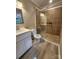 Modern bathroom with a glass shower door, tile floors and a contemporary vanity at 409 S Martin Luther King Jr Ave, Salisbury, NC 28144