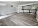 Spacious living room with updated flooring and modern gray and white paint at 409 S Martin Luther King Jr Ave, Salisbury, NC 28144