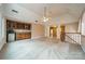 Spacious bonus room featuring a wet bar, and neutral carpet at 4509 Rosecliff Dr, Charlotte, NC 28277