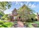 Charming two-story brick home featuring a landscaped front yard and inviting entrance at 4509 Rosecliff Dr, Charlotte, NC 28277